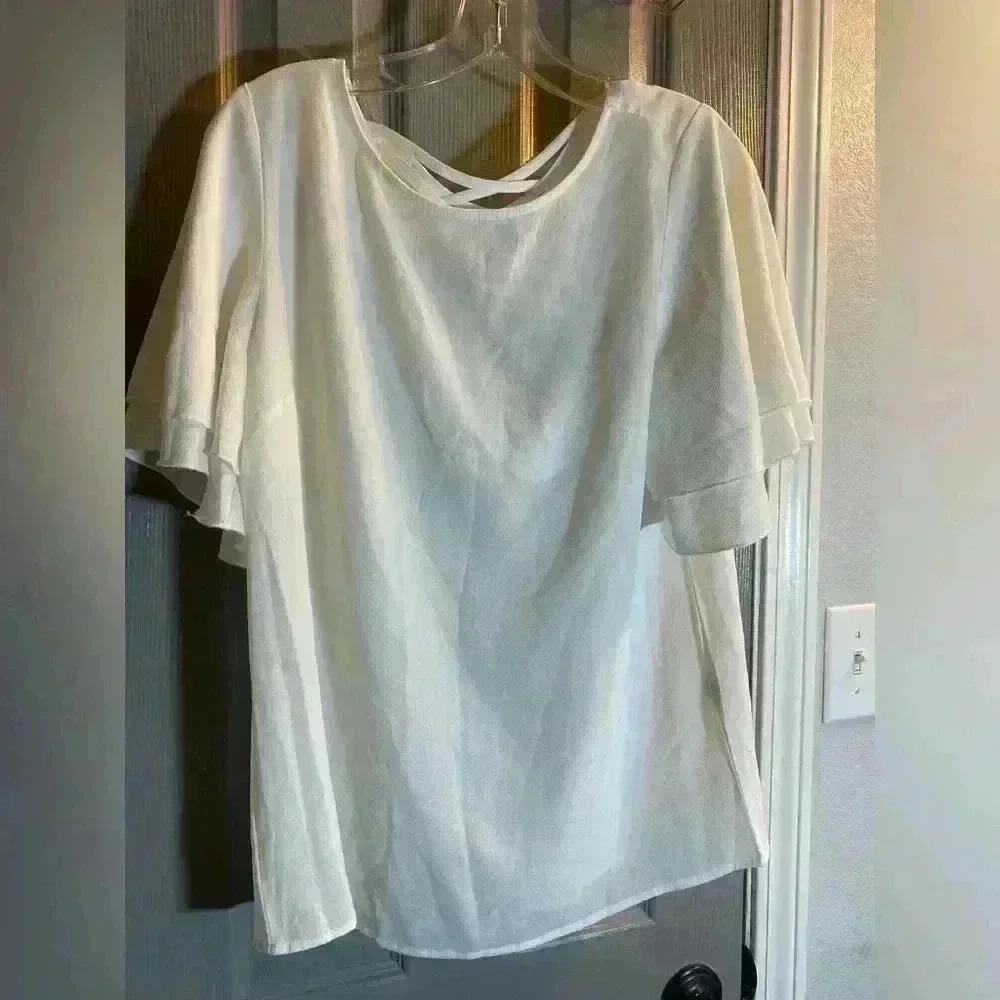 Ladies sheer white shirt sleeve blouse. Size medium
